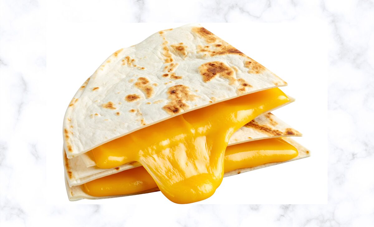 A Nachoz quesadilla pulled apart showing a stretch of real melted cheese